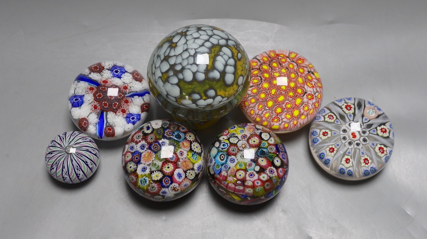 A selection of seven art glass paperweights